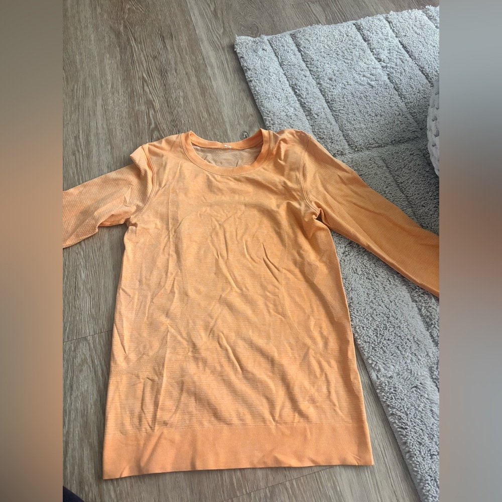 Orange Long Sleeve Shirt LULULEMON 
USED ONES
